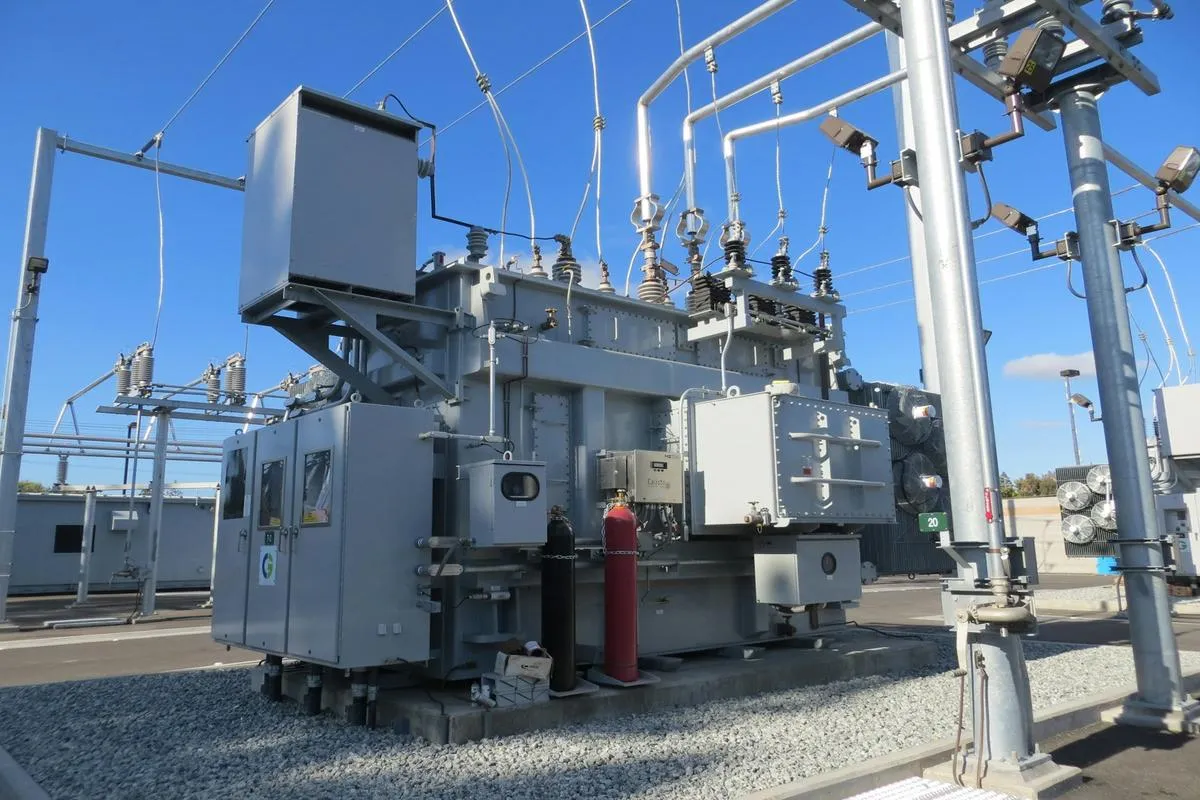 Electrical substation under construction beside transmission equipment
