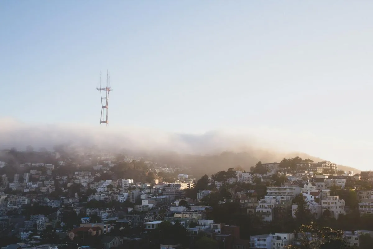 View of San Francisco houses on hills with bay in background