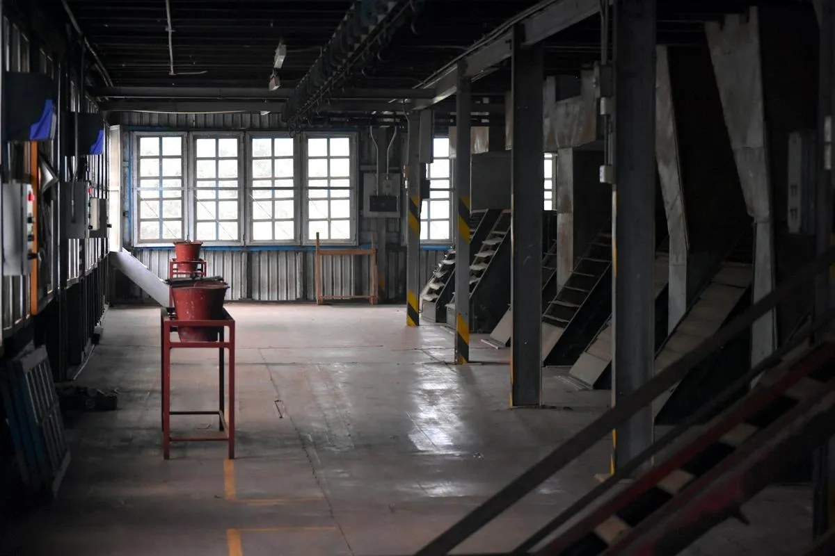 Empty automated factory floor with idle robots