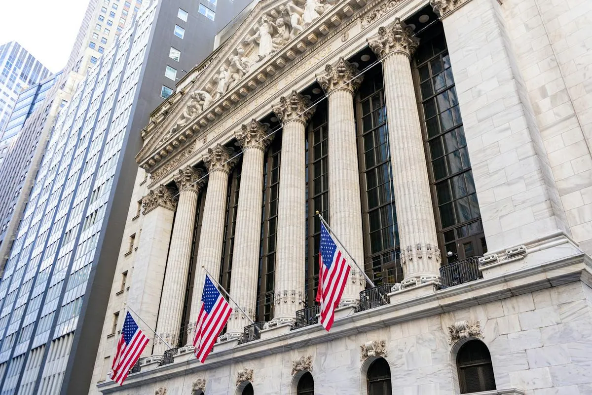 Traders working on a busy stock market trading floor