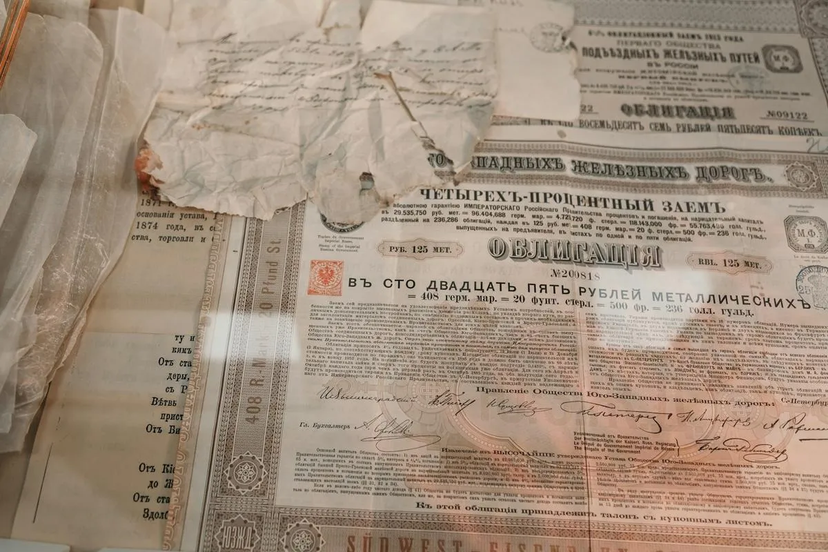 Close-up of Treasury bond certificates and auction data