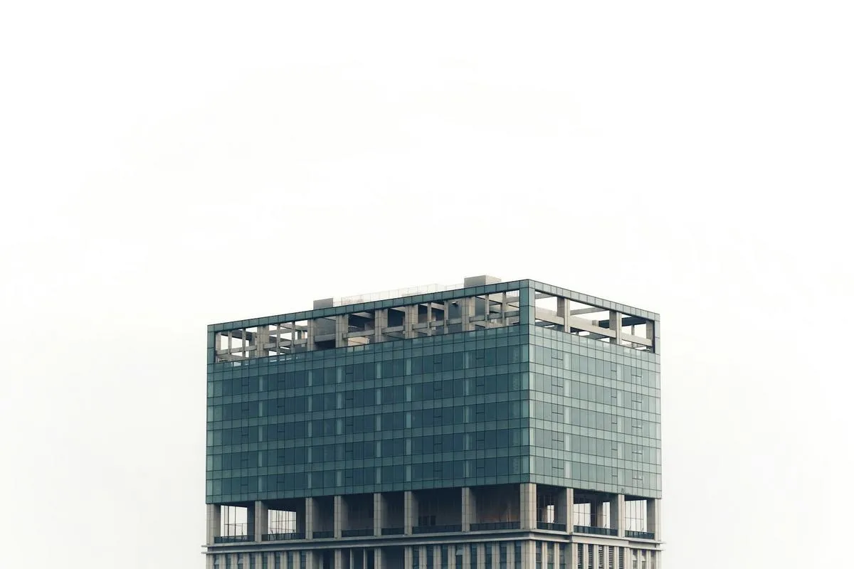 Empty office tower with dark windows
