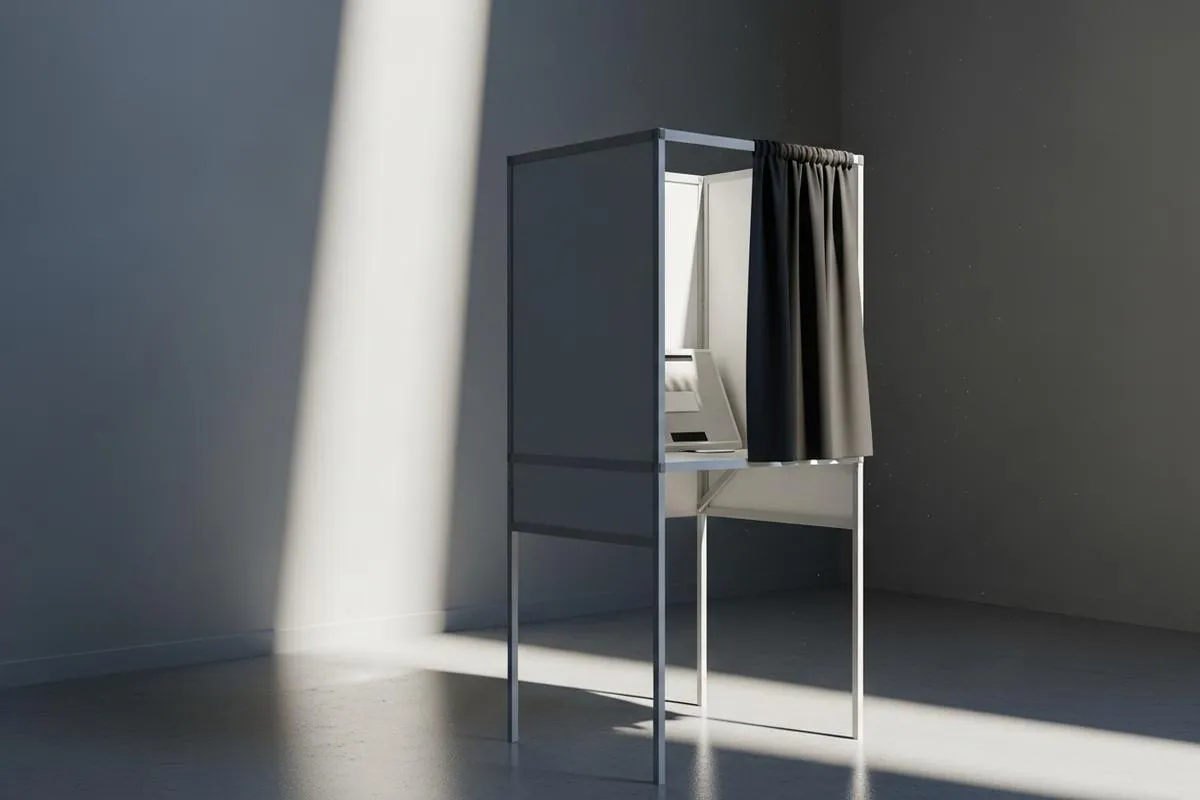 A single voting booth in a clean, quiet room, bathed in a solitary ray of light.