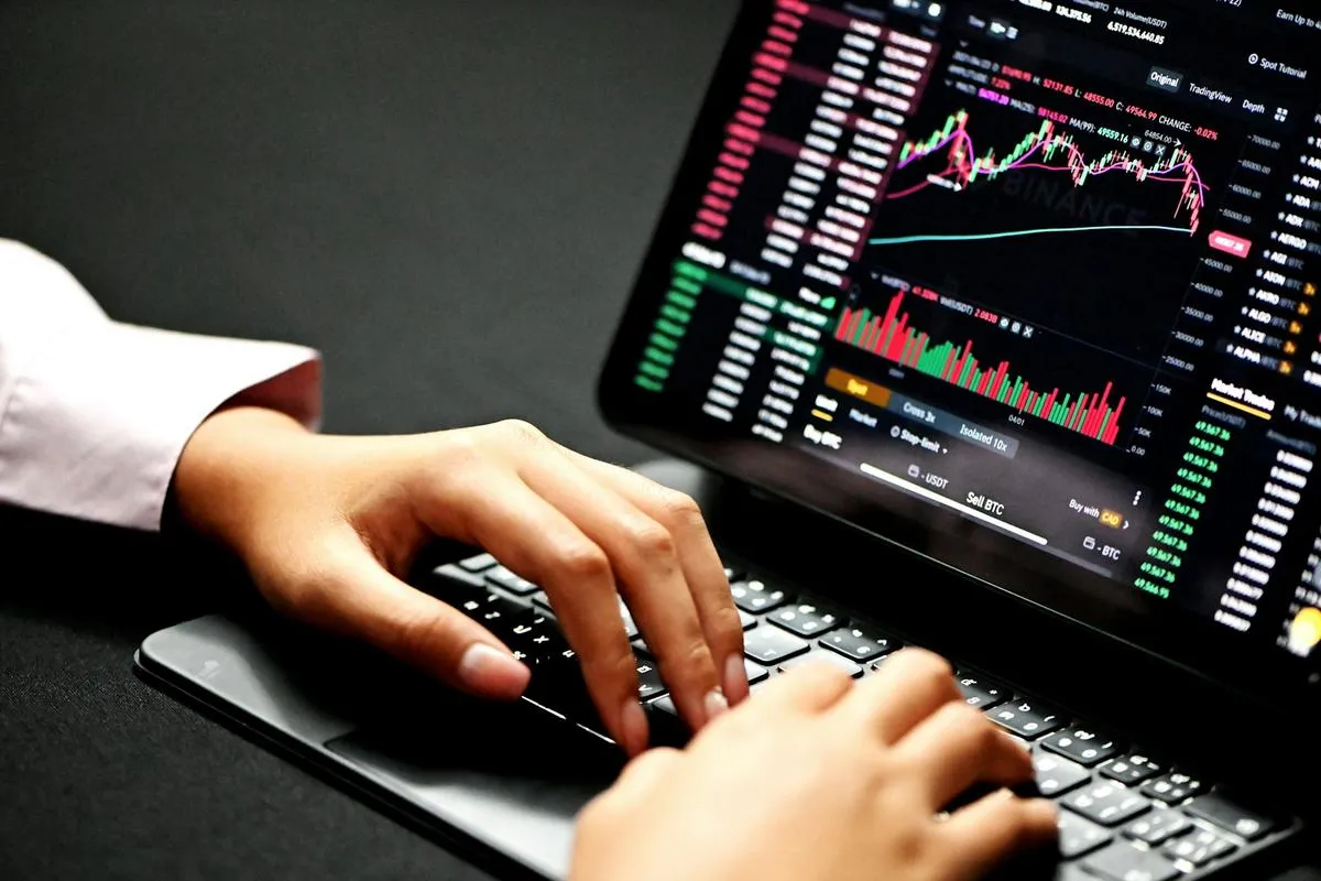 Bond trading desk with market screens